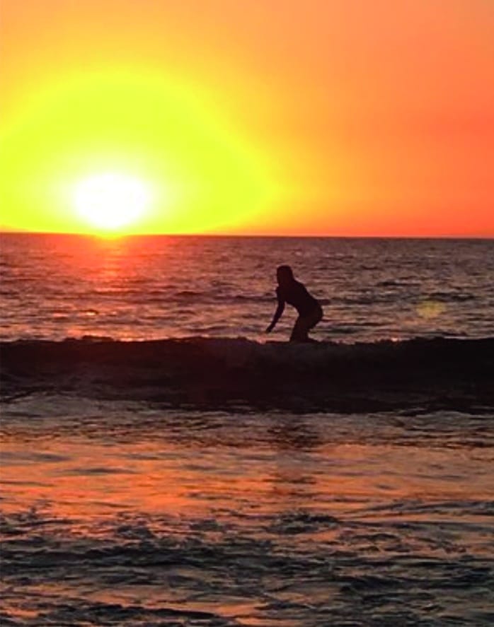 Surfing during the sunset